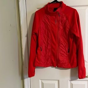 Reebok full zip jacket for women with pockets on the front. Size L